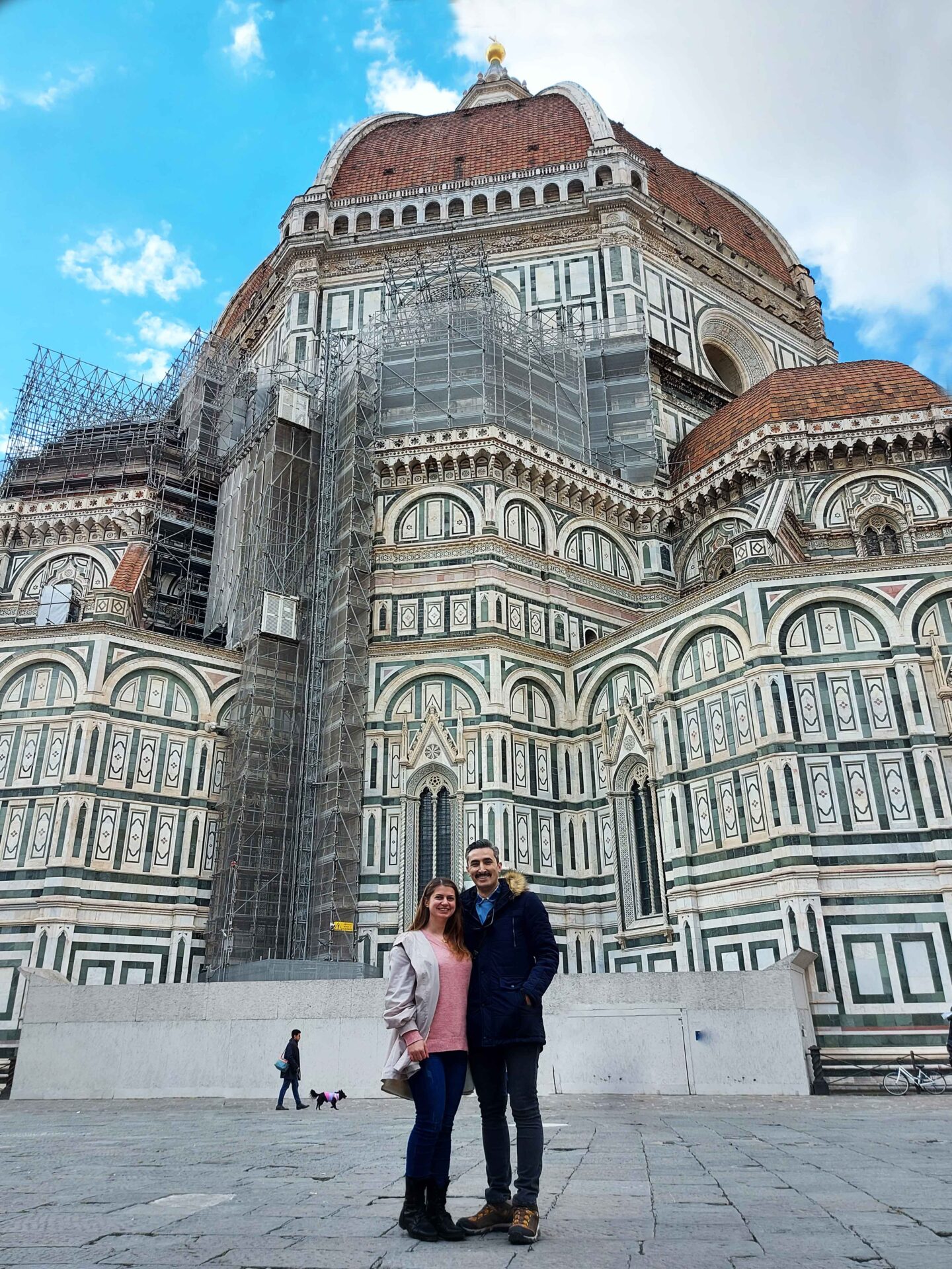 couple travel to basilica church in florence in spring 2022